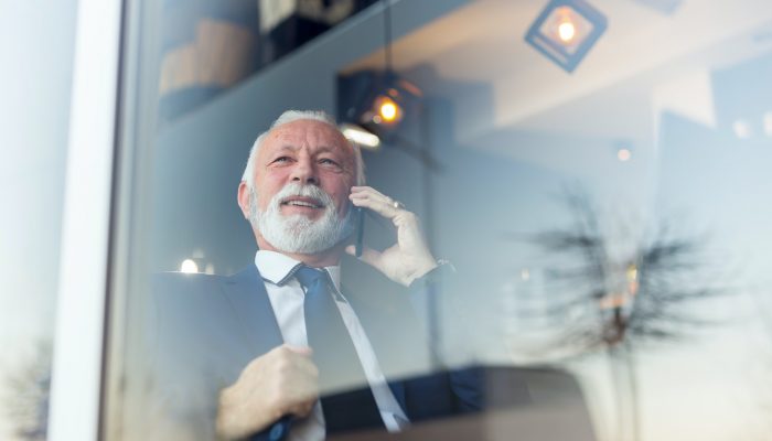 Senior businessman speaking on the phone